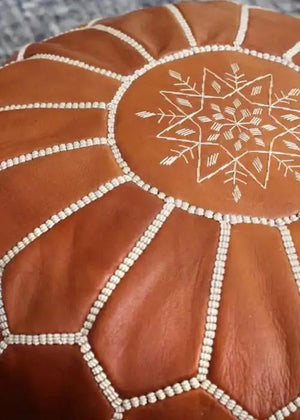 Traditional brown Moroccan leather pouf craftsmanship detail