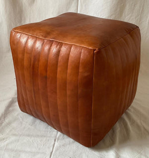 Handmade Moroccan Goatskin Leather Square Ottoman Pouf – Ribbed Brown – original three-quarter view with vertical stitching
