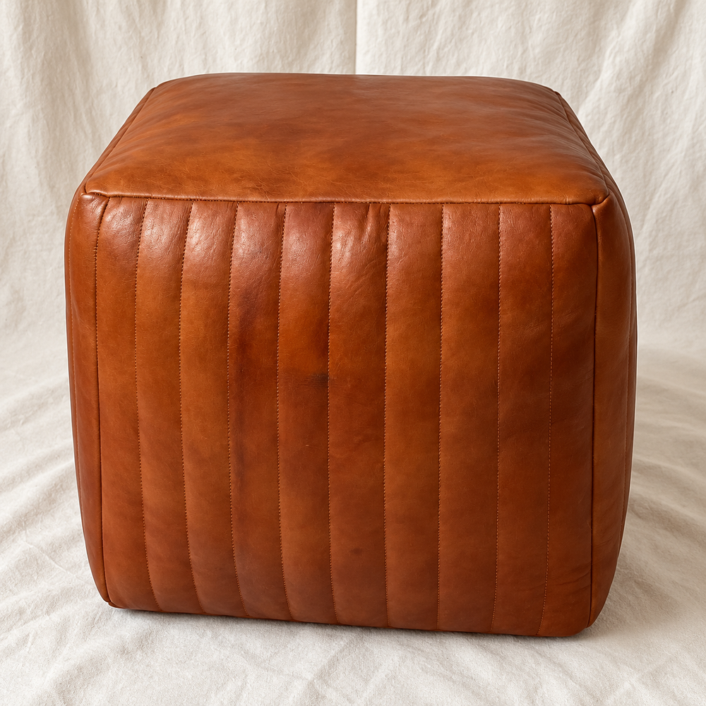 Handmade Moroccan Goatskin Leather Square Ottoman Pouf – Ribbed Brown – original three-quarter view with vertical stitching